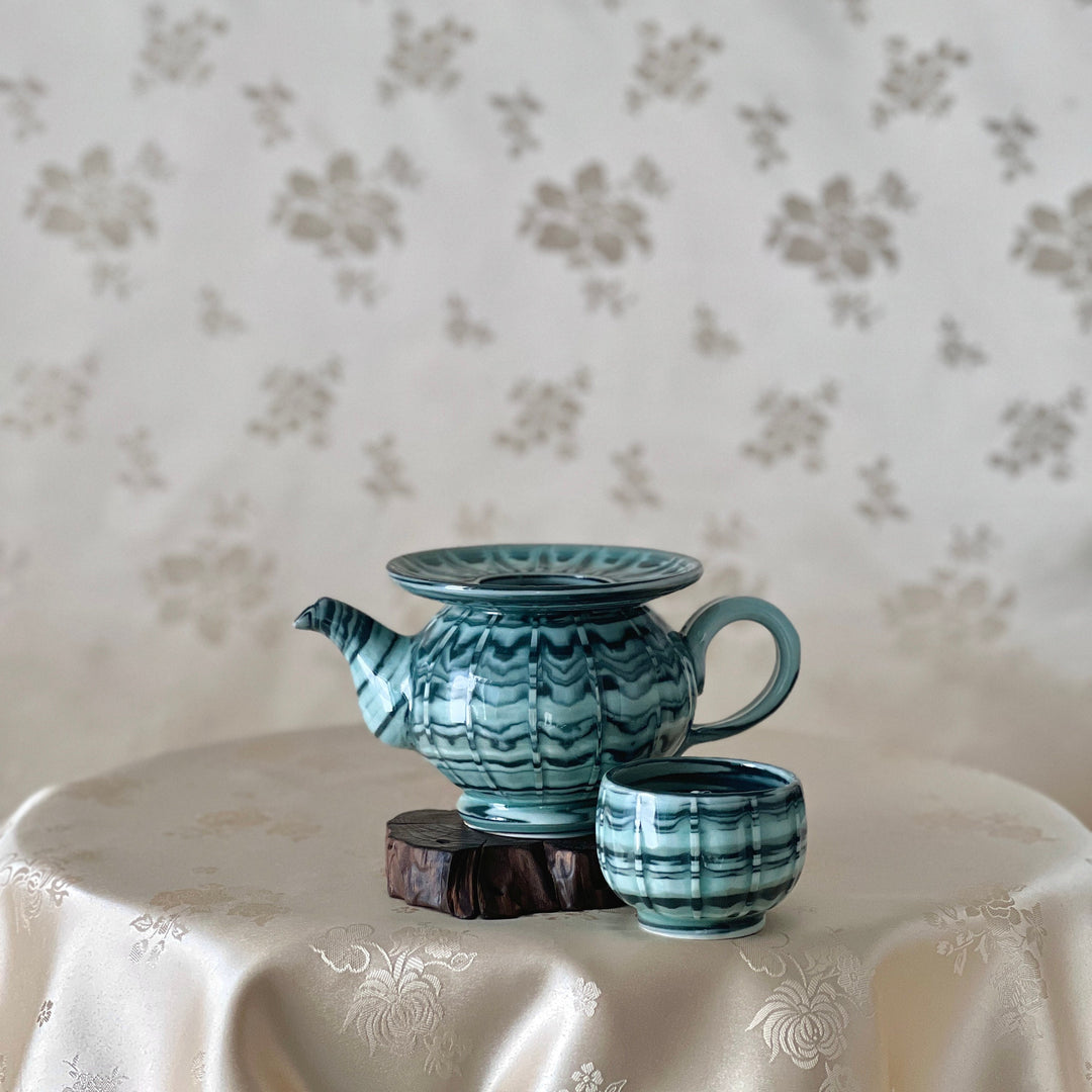 Celadon Pythagorean Cup with Swirling Mixed Clay Design