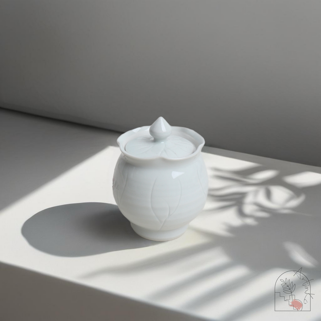 White Porcelain Tea Caddy with Lotus Leaf Design