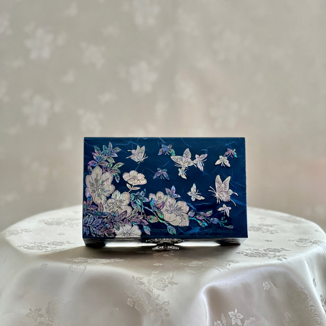 Upper view of Handmade Korean mother of pearl jewelry box with crane and pine pattern on navy paper-layered design, perfect for storing valuable jewelry.