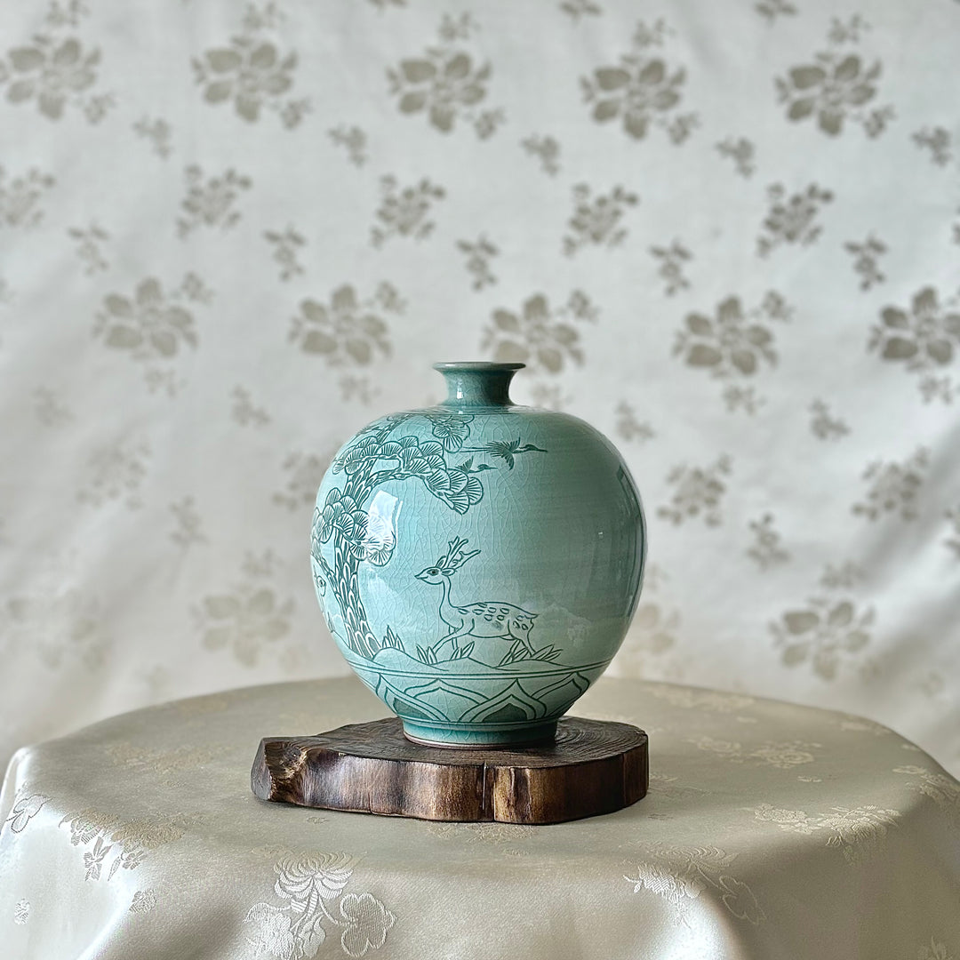 White Celadon Vase with Engraved Pine Tree, Crane and Deer Pattern