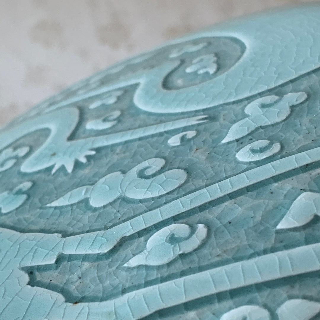 Large handmade celadon box with an intricate crane and cloud pattern, exemplifying traditional Korean artistry and elegance.