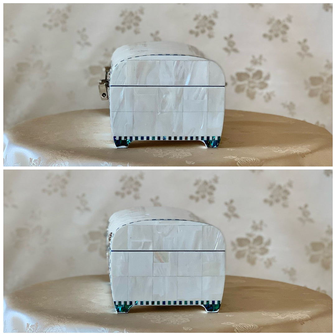 Side view of the handmade Korean white mother of pearl wooden jewelry box with a detailed checkered pattern.