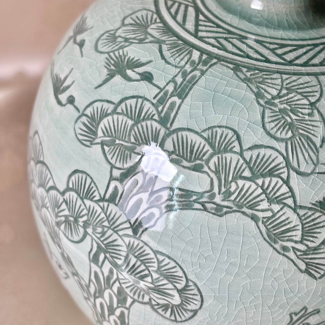 White Celadon Vase with Engraved Pine Tree, Crane and Deer Pattern