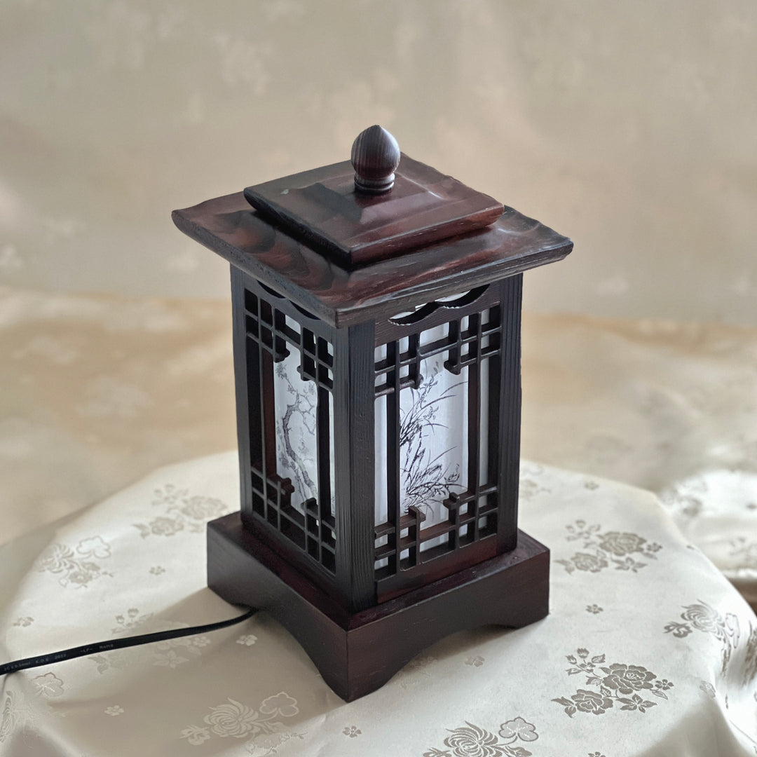 Detailed front view of the Korean wooden table lamp showcasing intricate Sagunja patterns.