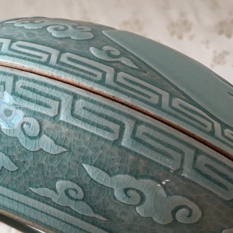 Large handmade celadon box with an intricate crane and cloud pattern, exemplifying traditional Korean artistry and elegance.