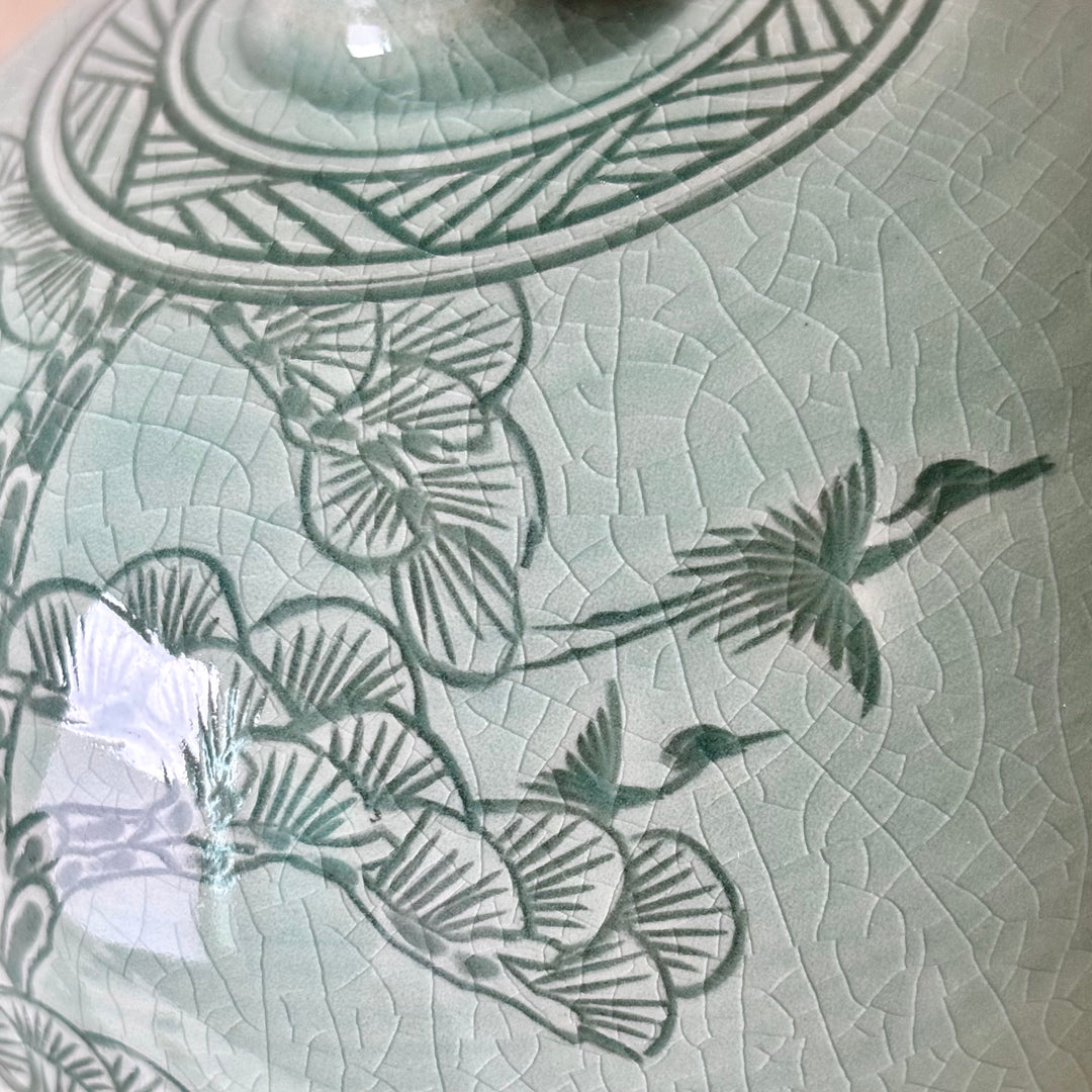 White Celadon Vase with Engraved Pine Tree, Crane and Deer Pattern