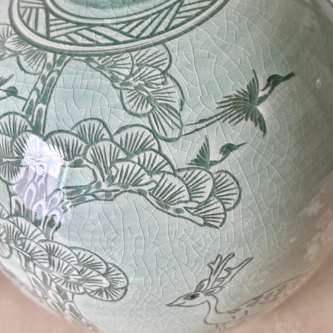 White Celadon Vase with Engraved Pine Tree, Crane and Deer Pattern