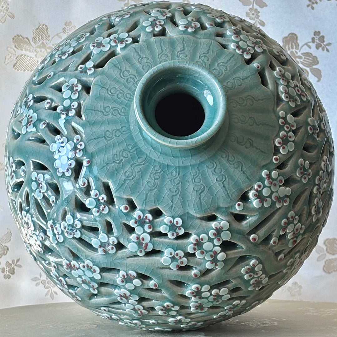 Celadon Double-Wall Openwork Vase with Plum Blossom Motif