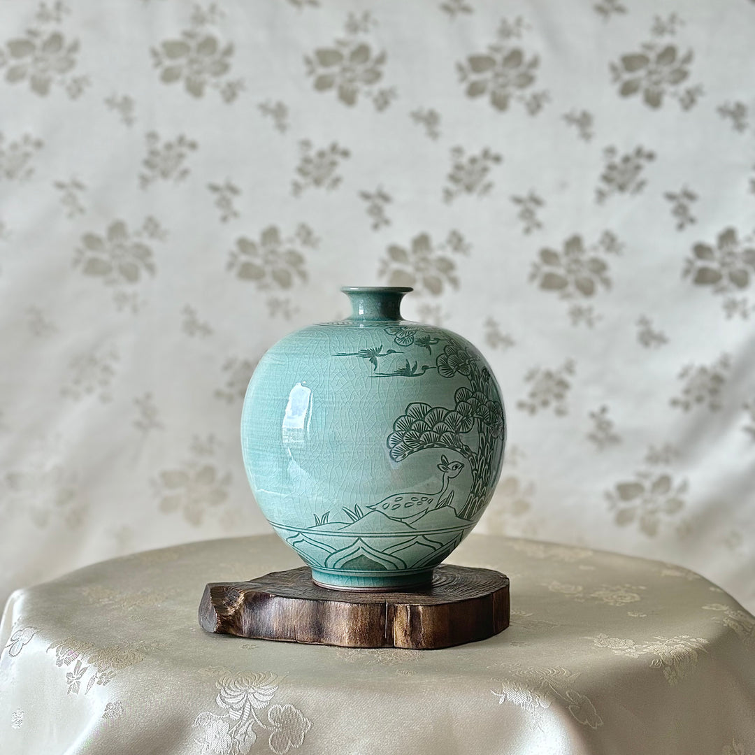 White Celadon Vase with Engraved Pine Tree, Crane and Deer Pattern