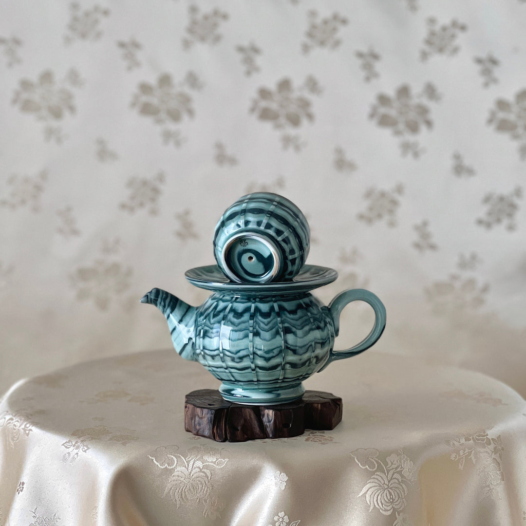 Celadon Pythagorean Cup with Swirling Mixed Clay Design