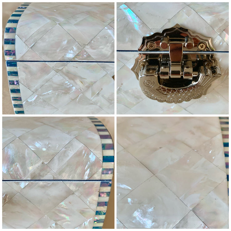 Close-up view of the checkered pattern on the white mother of pearl jewelry box.