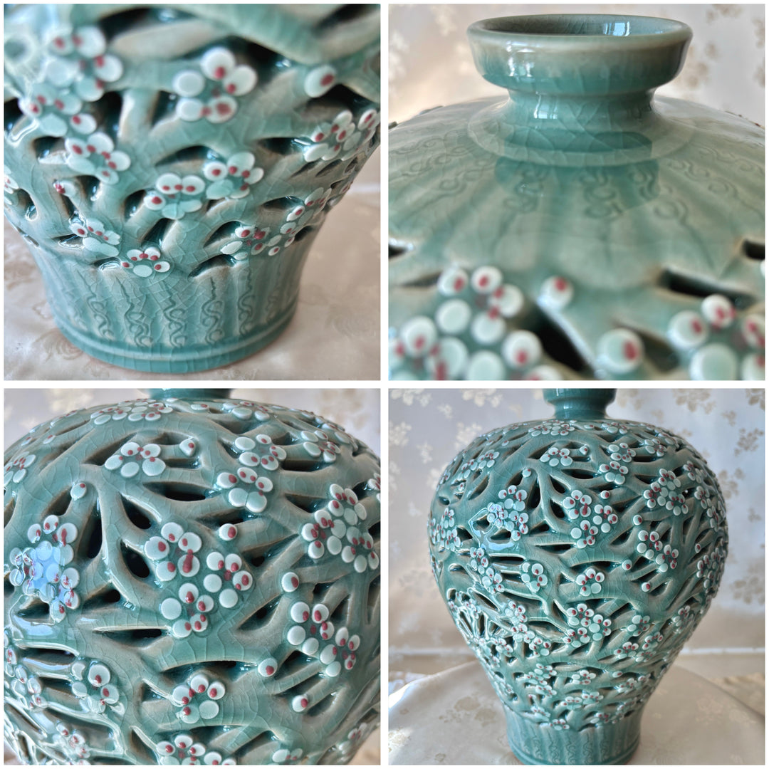 Handmade Korean celadon double-wall openwork vase featuring intricate plum blossom motifs in white and red, showcasing traditional craftsmanship.